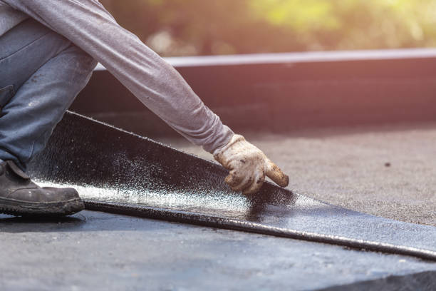 Professional Waterproofing technician working in Elwood, KS